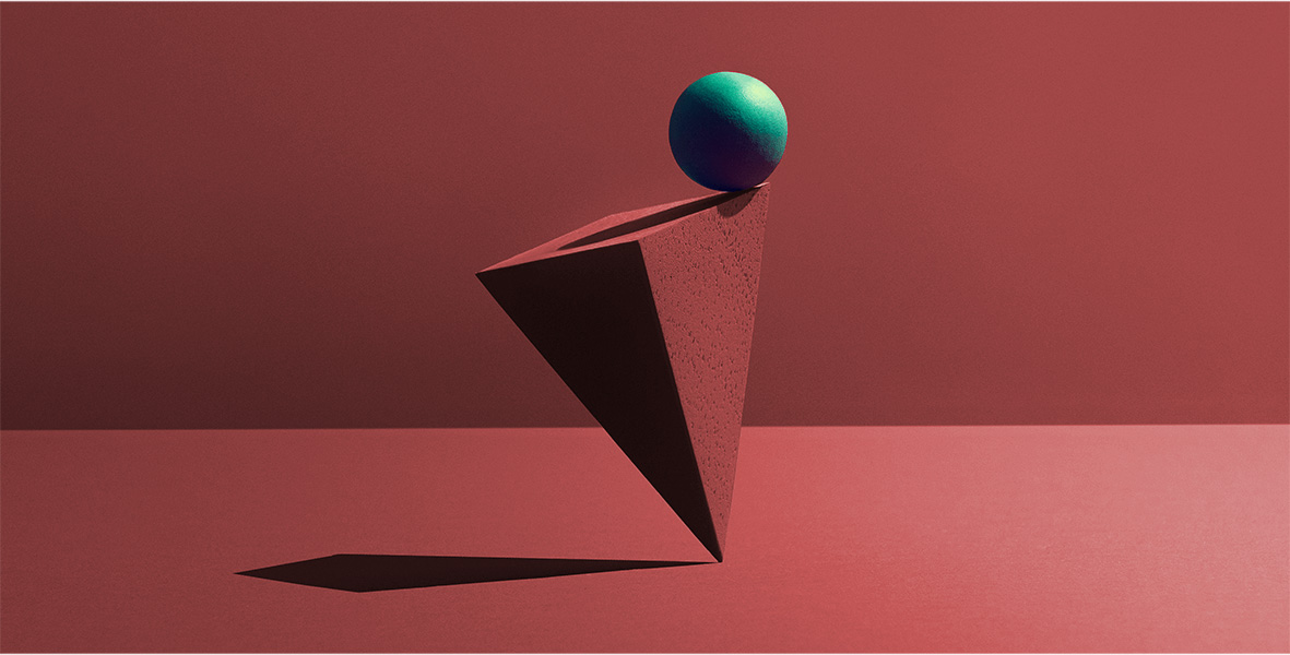 An abstract illustration of a green ball balancing on the edge of a 3D red triangle.